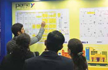 NA Daivik, Managing Director, Printools Corporation while finalising their stall location at PAMEX booth