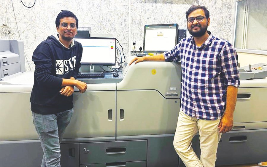 Giridhar Parimi and Harshit Parimi with RICOH Pro C7200x